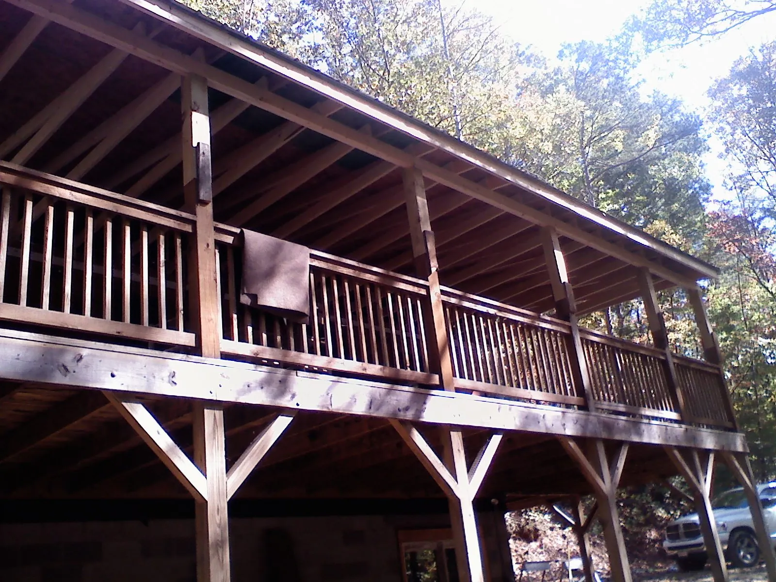 Timber framing under a new elevated porch and deck — Roof Leak Repair in Azle by Roofing Brothers